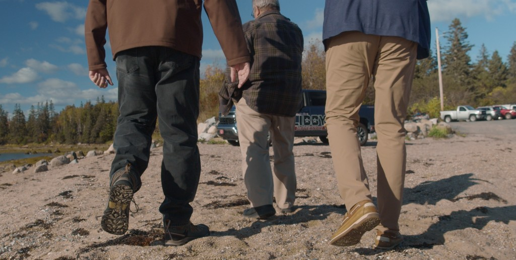 Field canvasser engaging with a voter at their doorstep